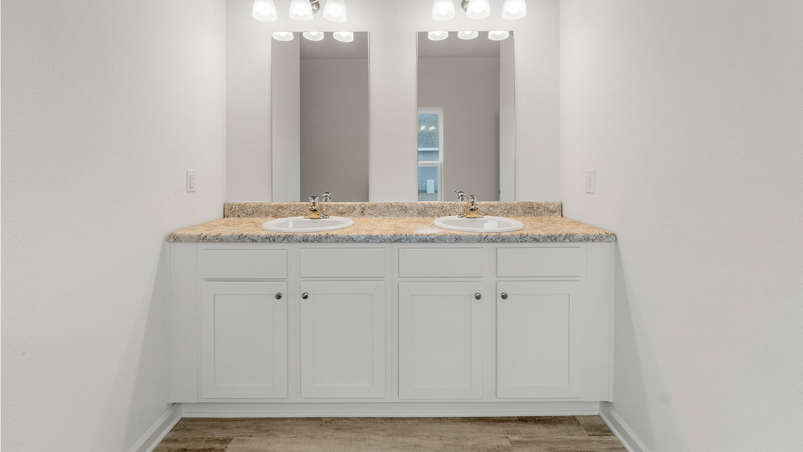 52 Elderberry Street Freeport, FL 32439 - Photo 9 of 36 a bathroom with a granite countertop sink and a mirror