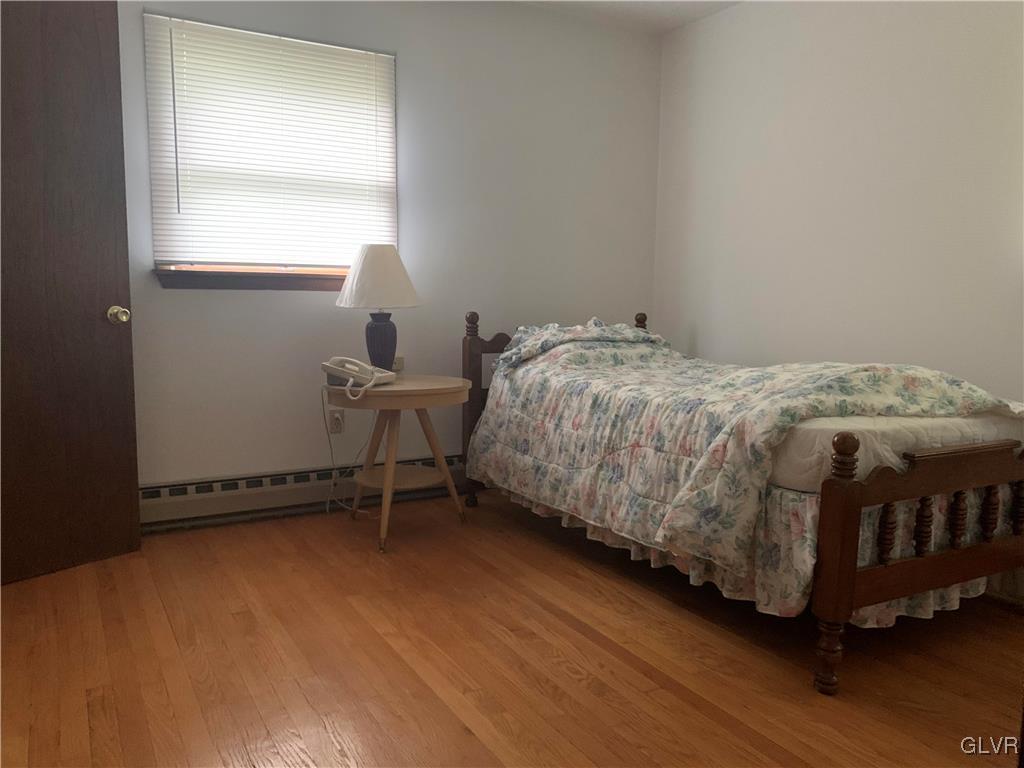 343 Haney Road Kunkletown, PA 18058 - Photo 14 of 27 a bedroom with a bed chair and window