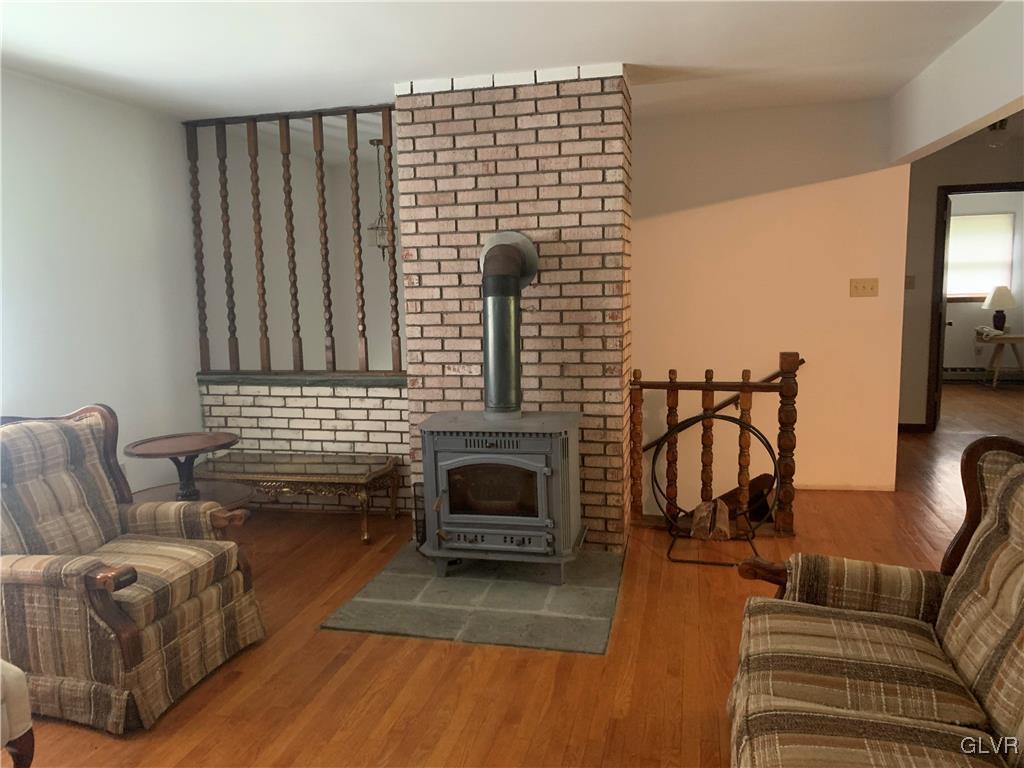 343 Haney Road Kunkletown, PA 18058 - Photo 8 of 27 a living room with furniture and a fireplace