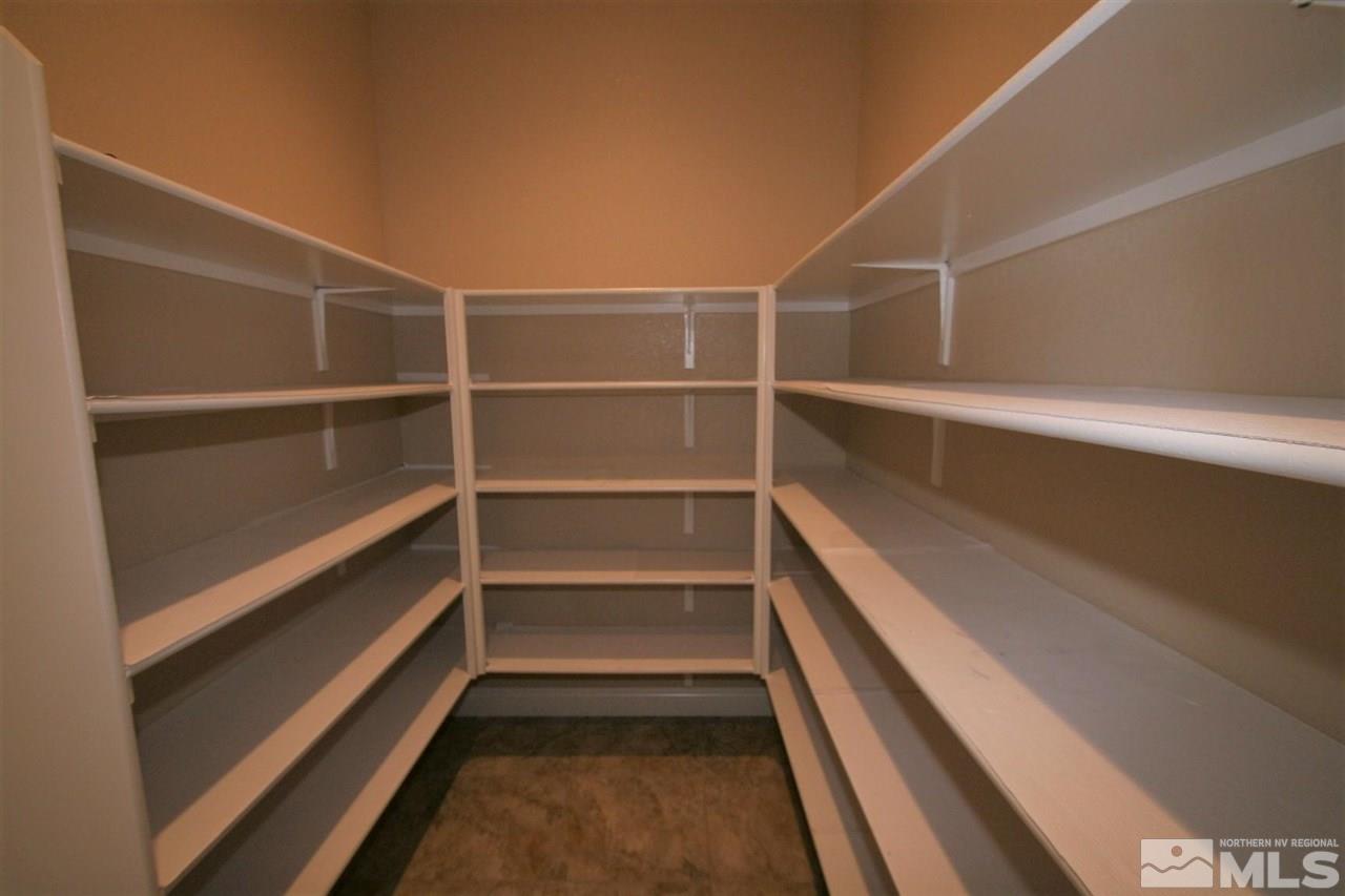 2098 Blue Boy Lane Reno, NV 89521 - Photo 11 of 26 a storage room with wooden floor