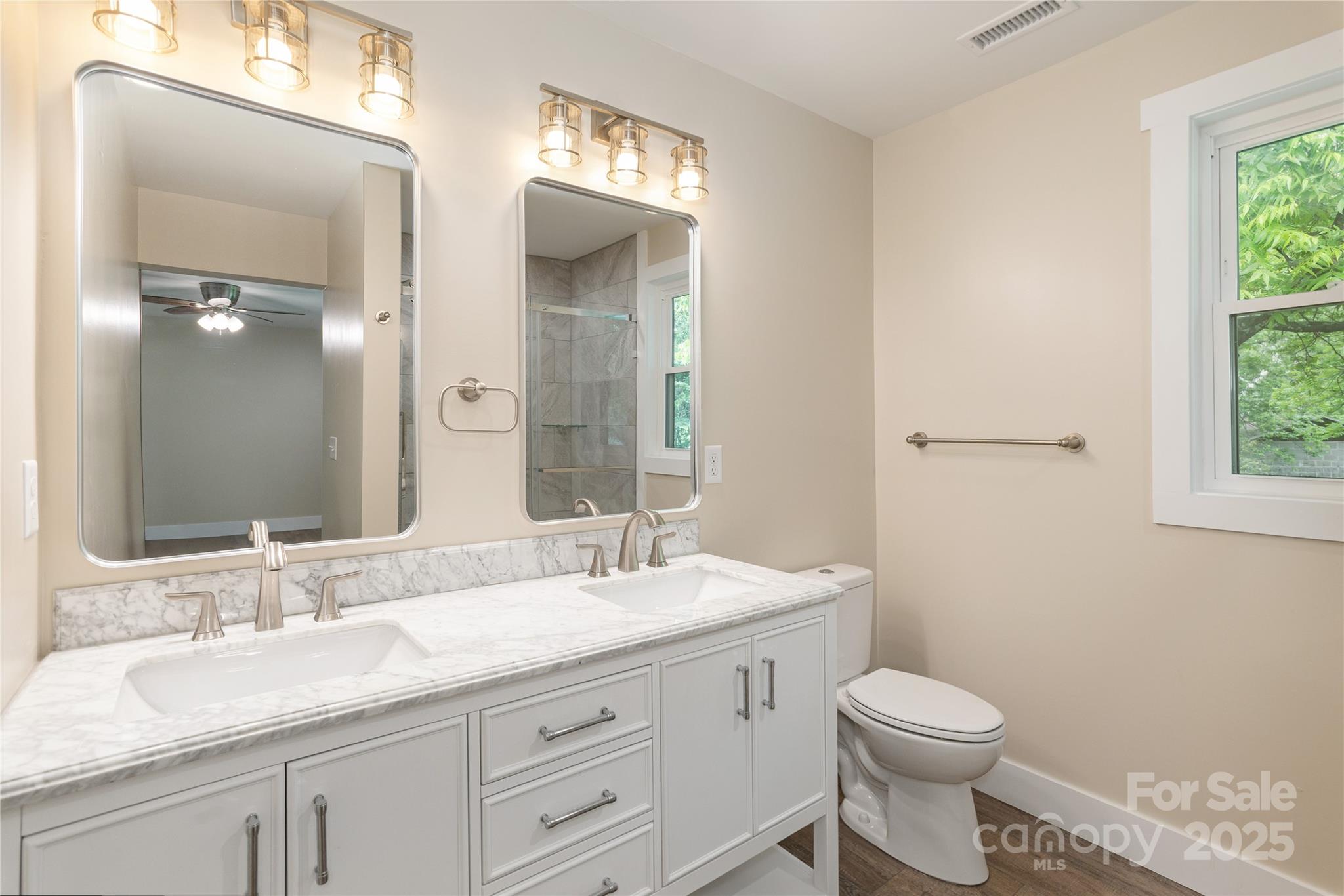 782 Poors Ford Road Rutherfordton, NC 28139 - Photo 16 of 25 a bathroom with a granite countertop toilet sink and mirror
