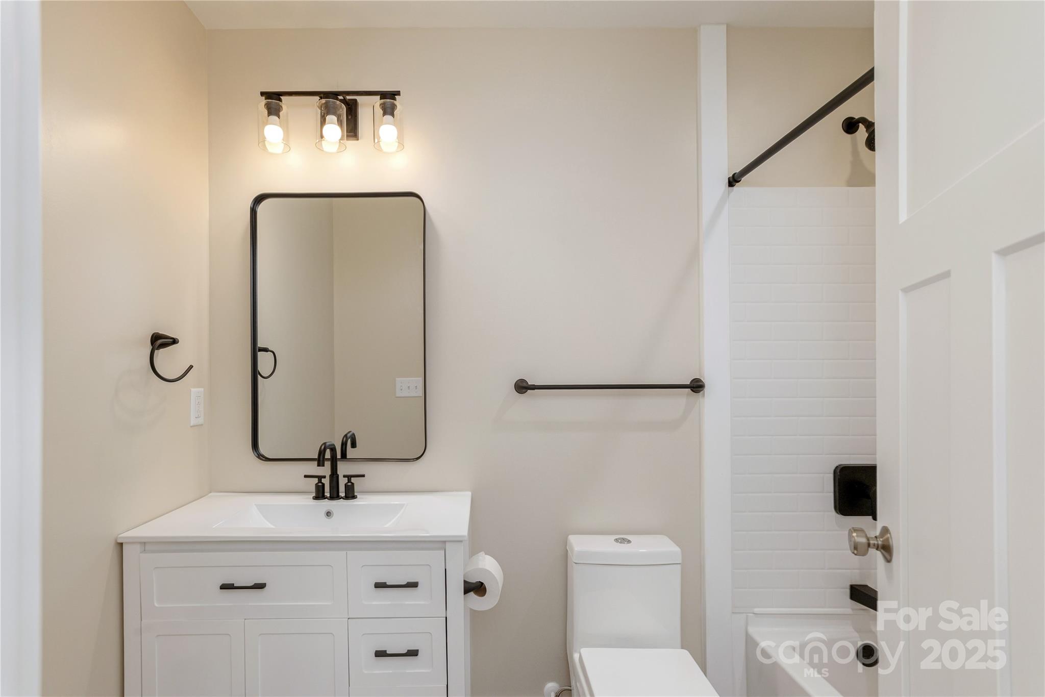 782 Poors Ford Road Rutherfordton, NC 28139 - Photo 19 of 25 a bathroom with a toilet sink and mirror