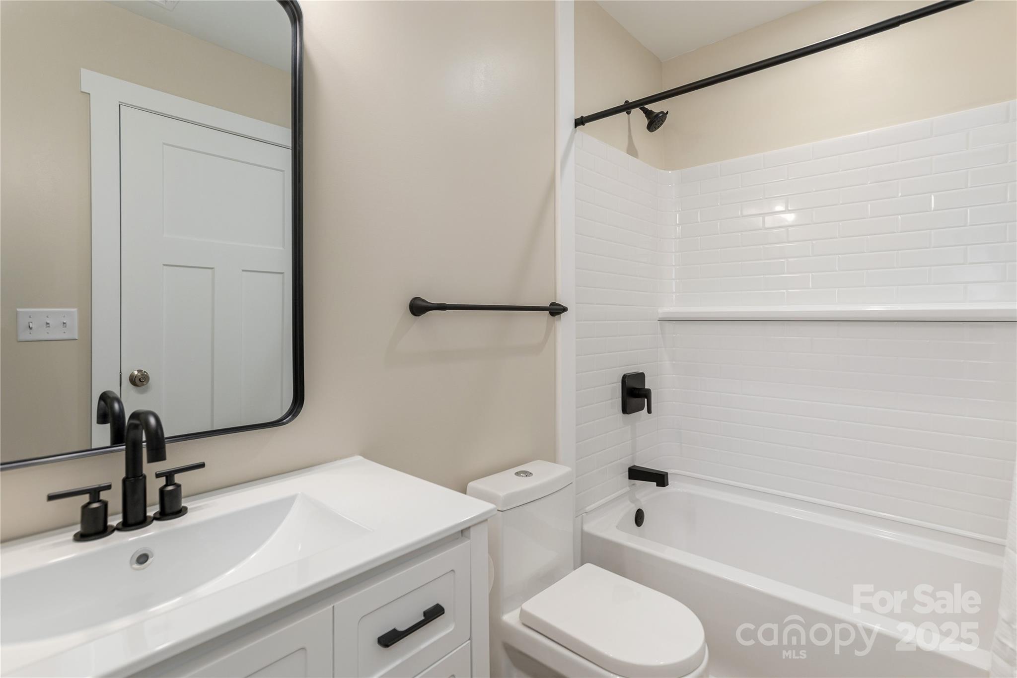 782 Poors Ford Road Rutherfordton, NC 28139 - Photo 20 of 25 a bathroom with a sink a toilet and a bathtub