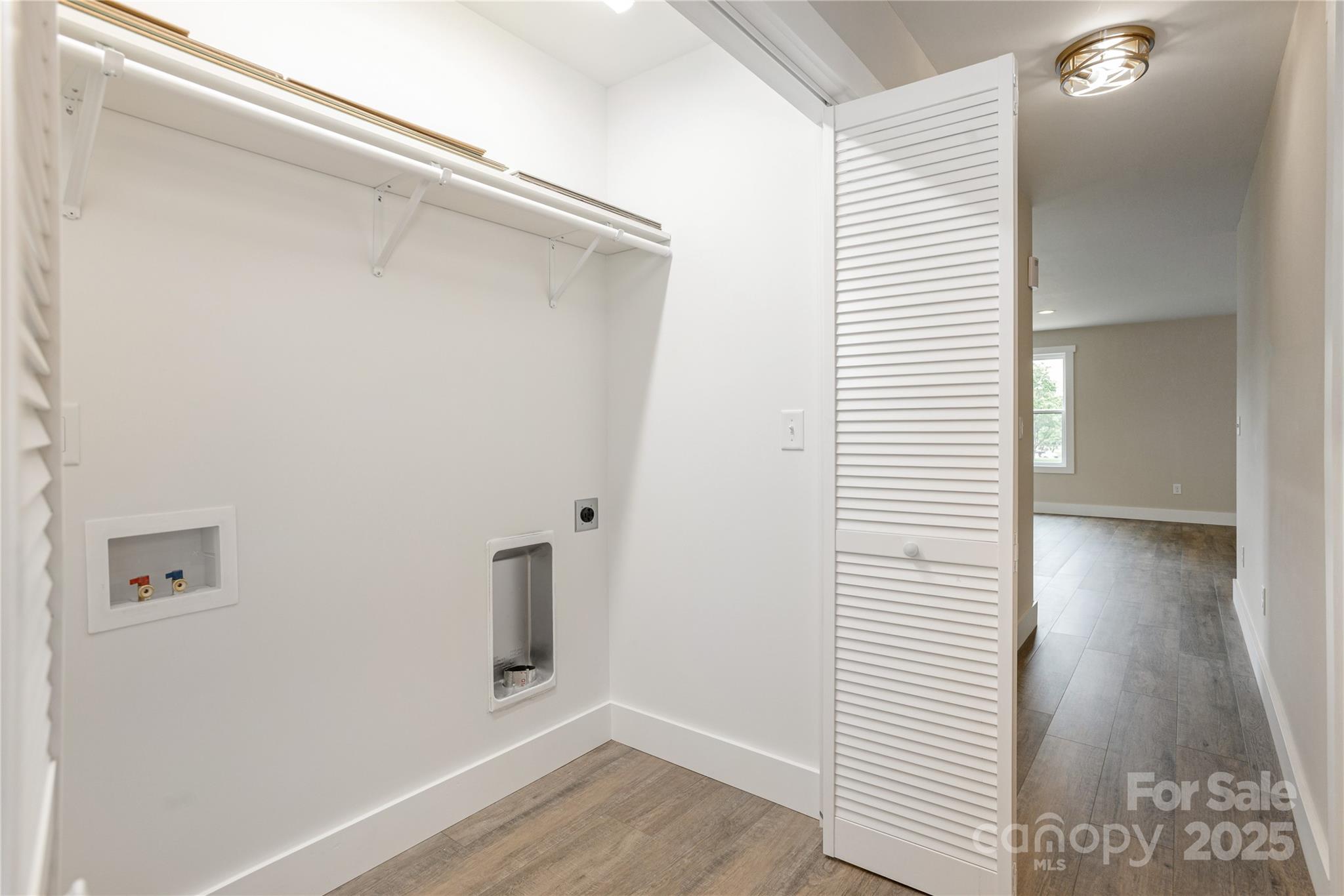 782 Poors Ford Road Rutherfordton, NC 28139 - Photo 22 of 25 a view of a hallway with wooden floor and staircase