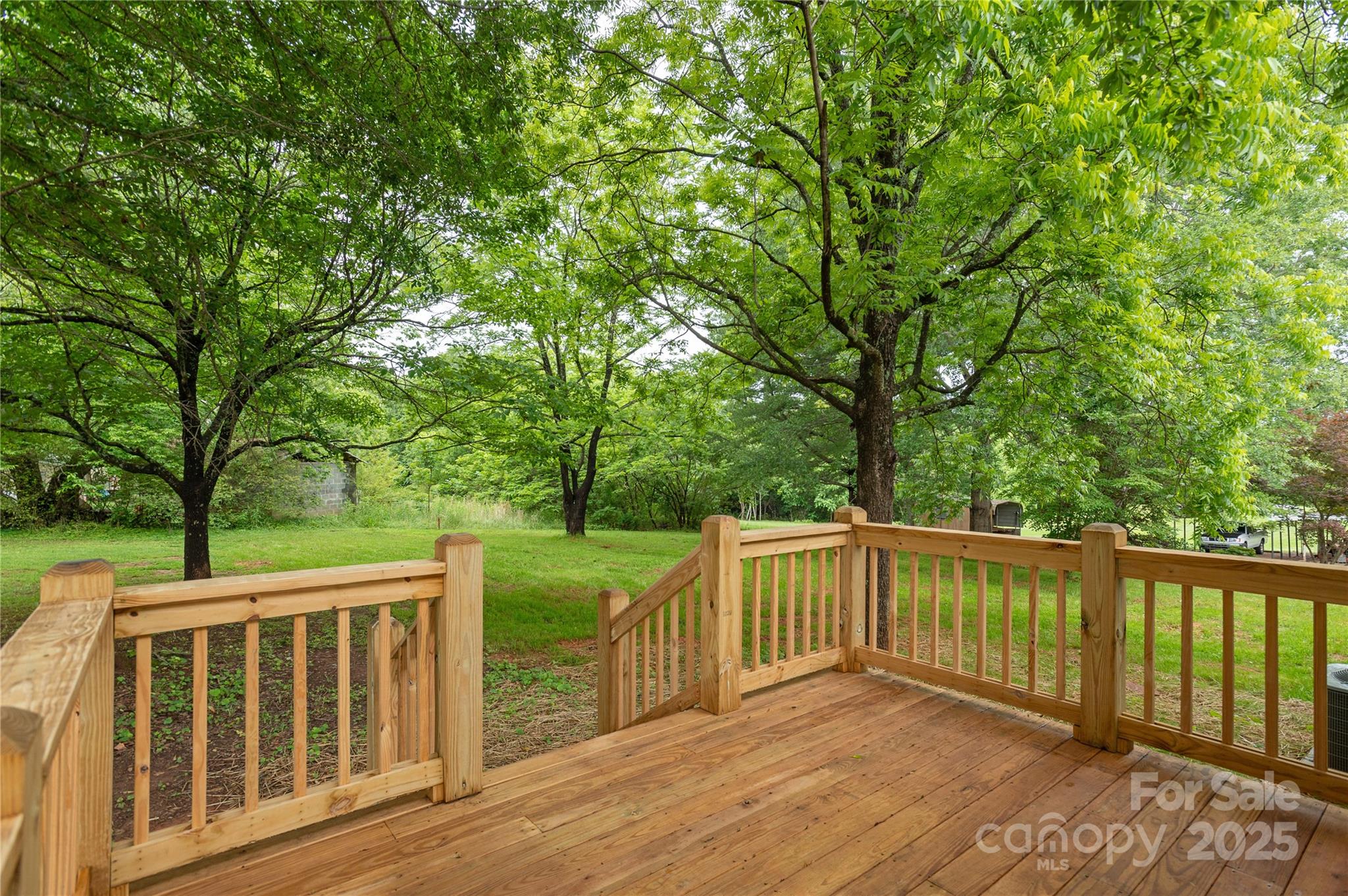 782 Poors Ford Road Rutherfordton, NC 28139 - Photo 23 of 25 a view of a wooden deck and a big yard
