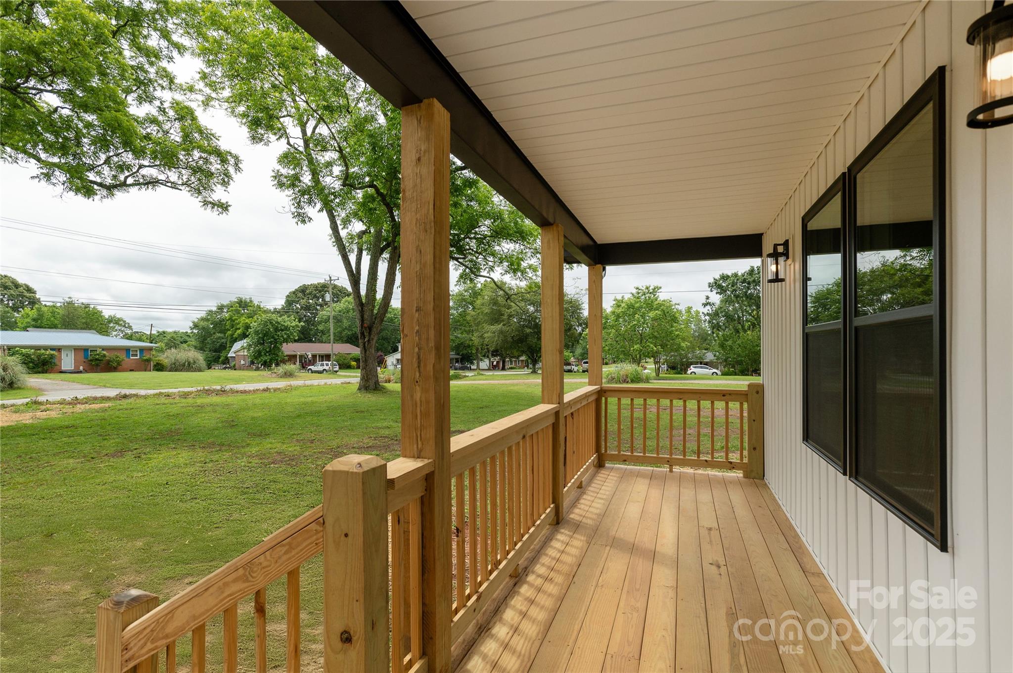 782 Poors Ford Road Rutherfordton, NC 28139 - Photo 3 of 25 a view of a balcony with lake view and a floor to ceiling window