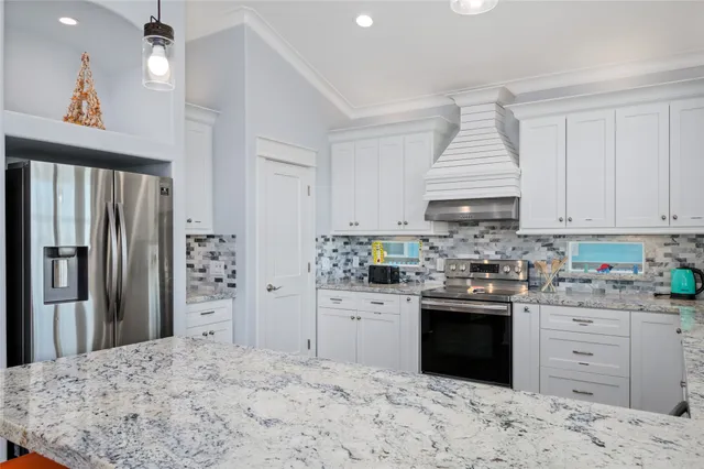 a bedroom with a bed and furniture