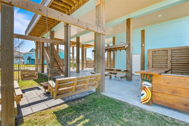 a living room filled with furniture and a table