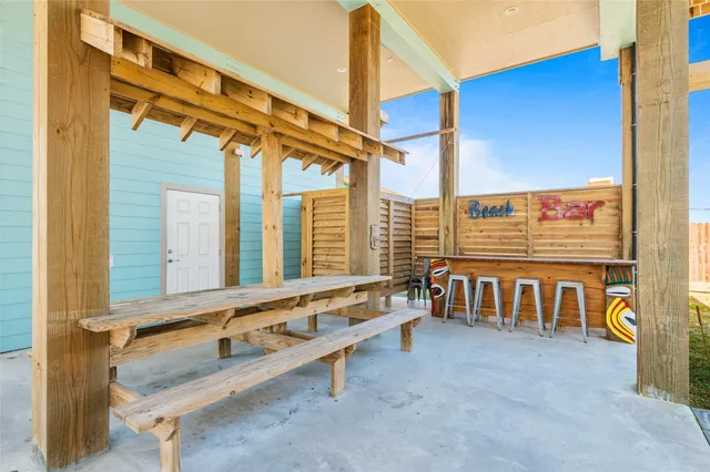 a view of a livingroom with furniture window and wooden floor