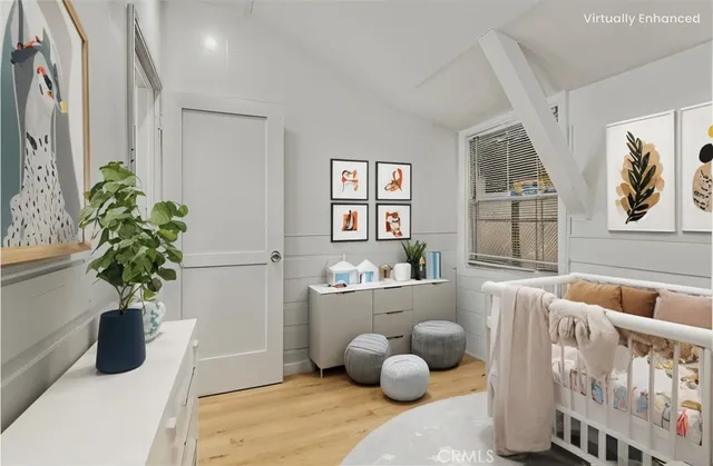 a living room with furniture and flowers