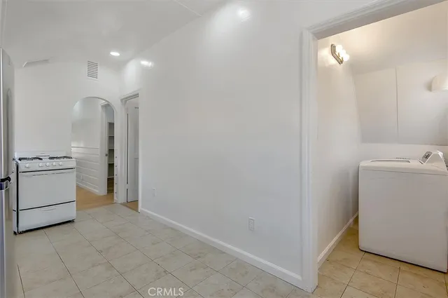 a view of a storage & utility room with washer and dryer
