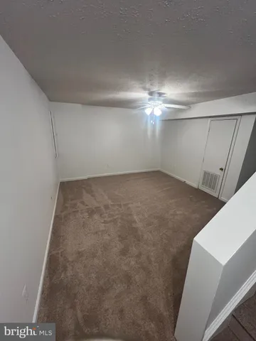 a view of a room with an empty space