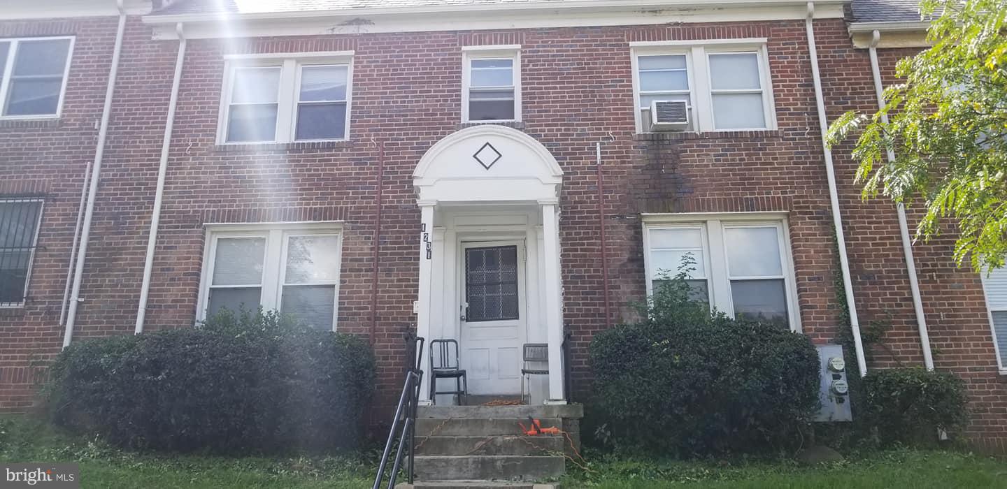 1231 Meigs Place Northeast Washington, DC 20002 - Photo 1 of 1 a front view of a house with plants