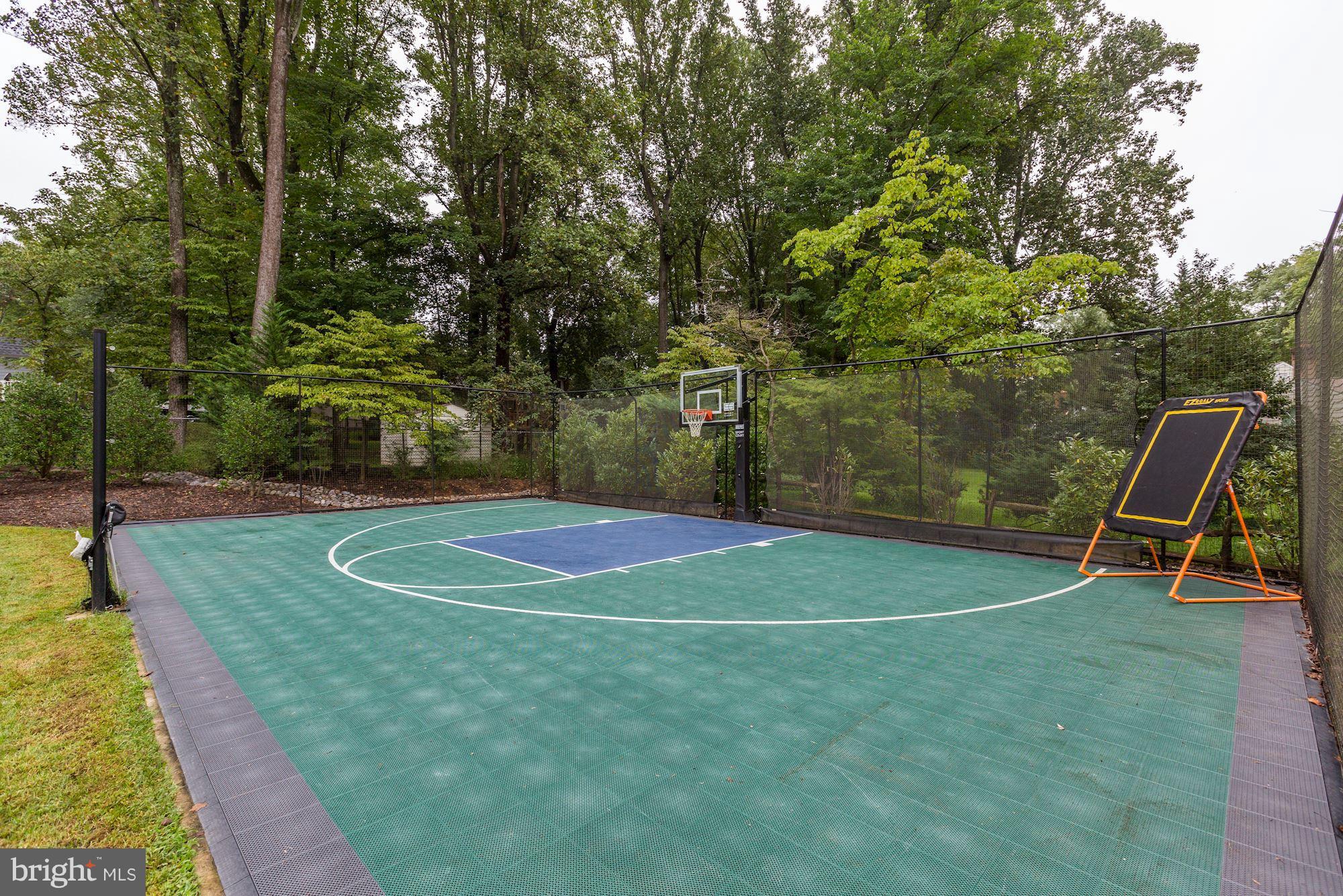 8405 Kingsgate Road Potomac, MD 20854 - Photo 14 of 30 a view of a tennis court