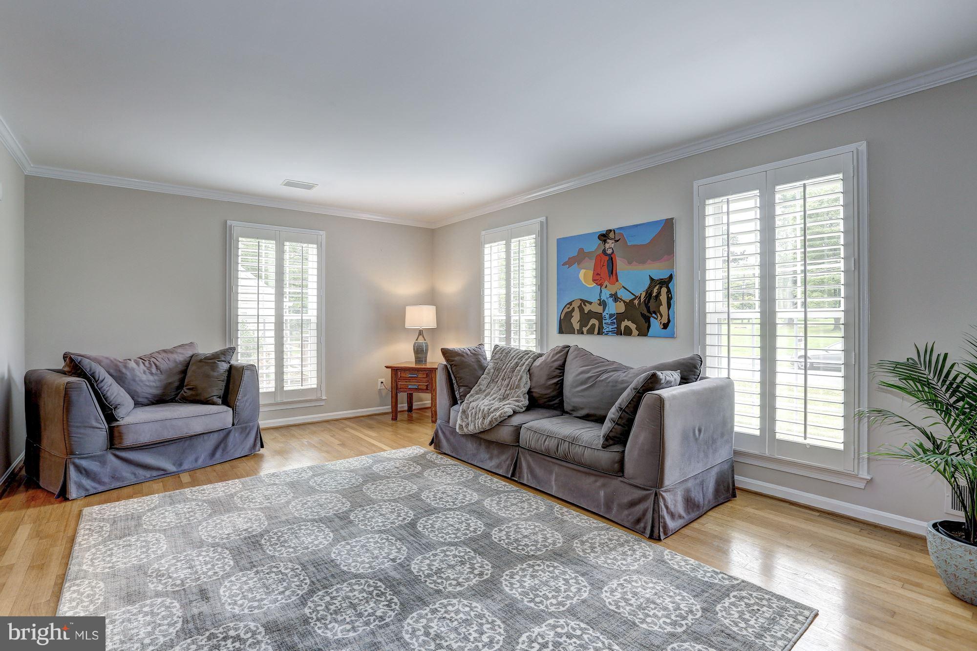 8405 Kingsgate Road Potomac, MD 20854 - Photo 17 of 30 a living room with furniture and a window