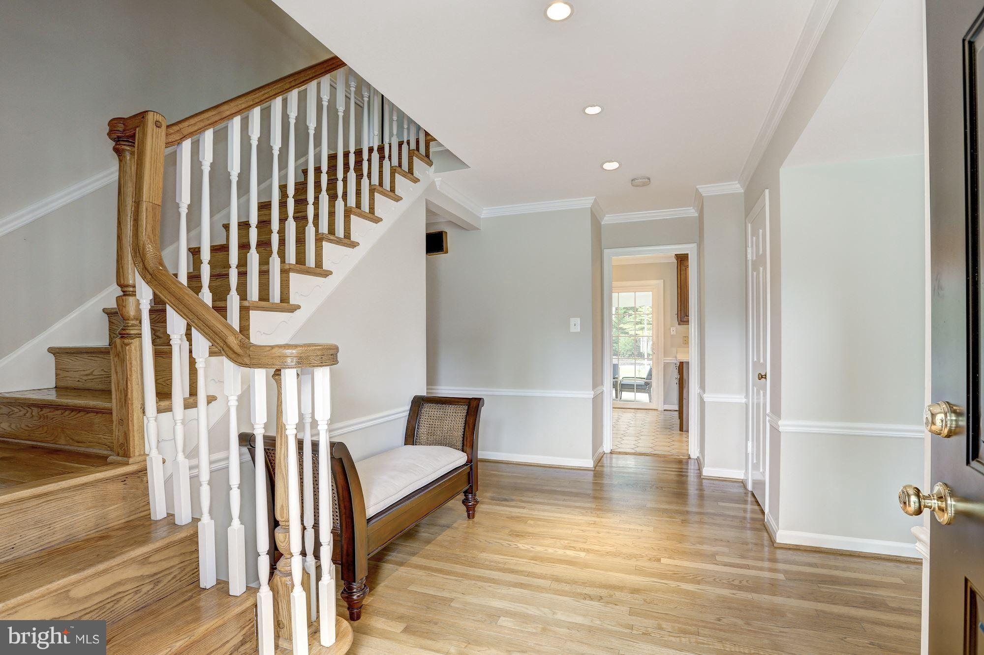 8405 Kingsgate Road Potomac, MD 20854 - Photo 3 of 30 a view of entryway and hall with wooden floor