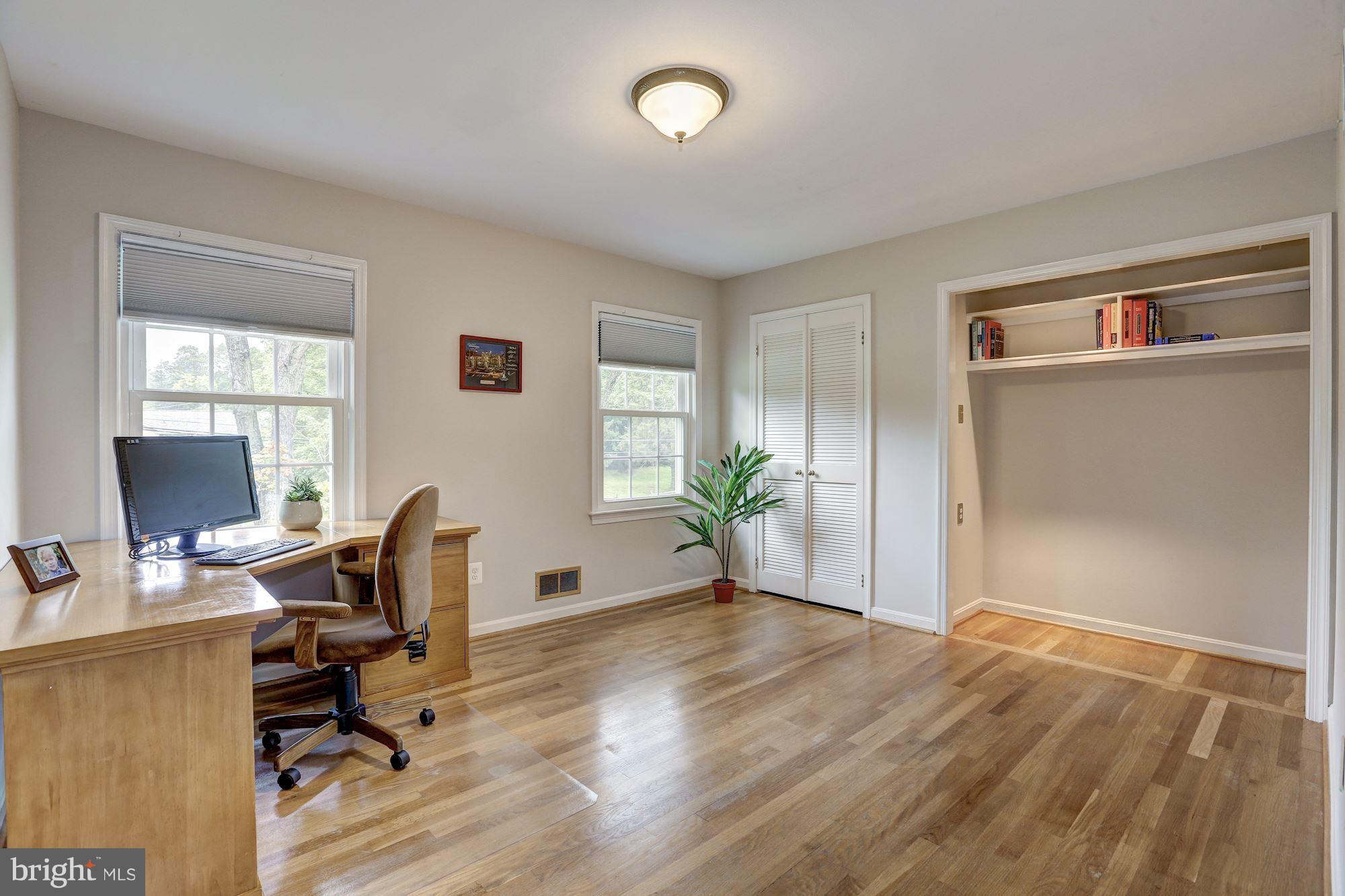 8405 Kingsgate Road Potomac, MD 20854 - Photo 25 of 30 a view of a workspace with furniture and a window