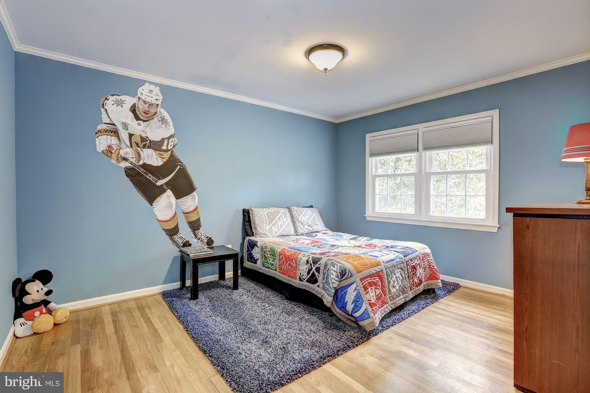 8405 Kingsgate Road Potomac, MD 20854 - Photo 26 of 30 a bedroom with a bed and a window