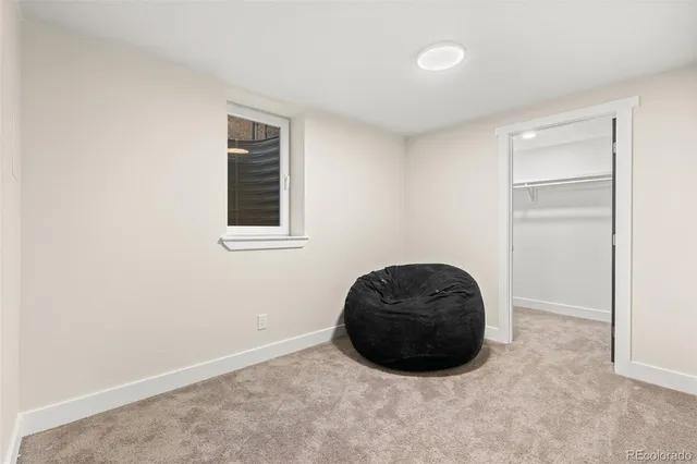 a room with a window and closet