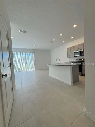 $1,895 | 7627 Waterscape Drive, Groveland, FL 34736