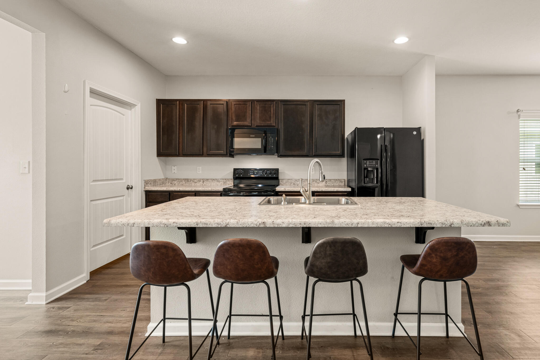 268 Cornelia Street Freeport, FL 32439 - Photo 11 of 41 a kitchen with a dining table and chairs