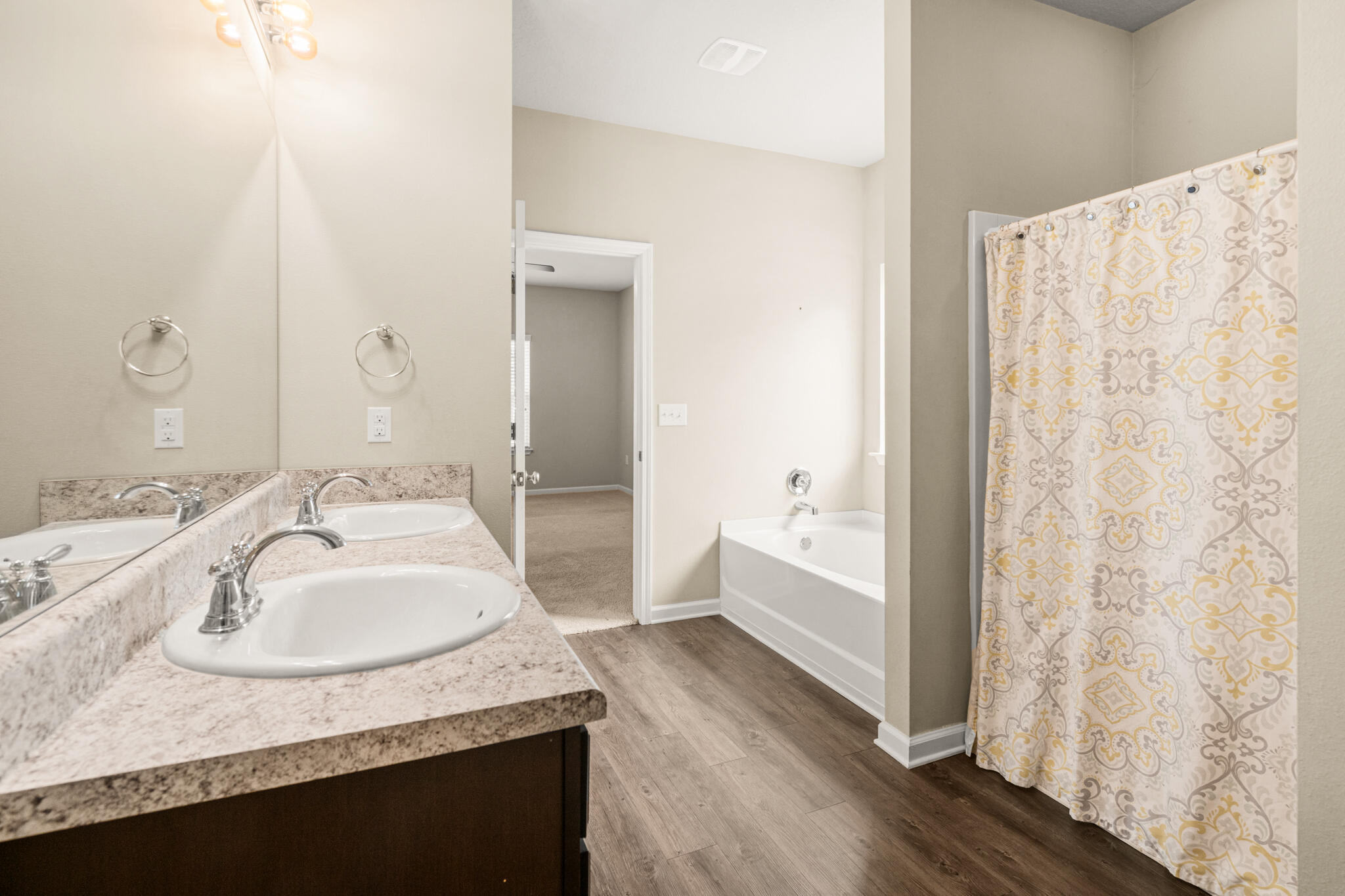 268 Cornelia Street Freeport, FL 32439 - Photo 18 of 41 a bathroom with a granite countertop sink and a mirror