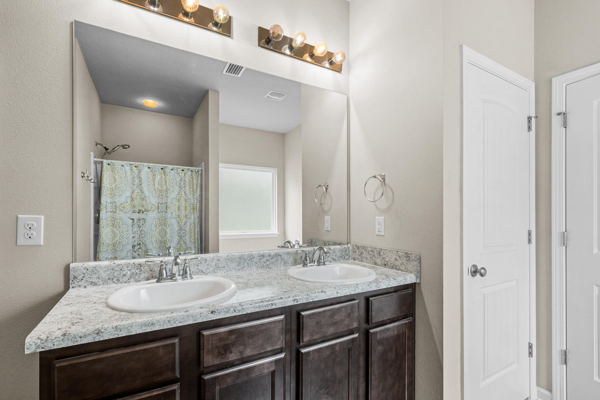 268 Cornelia Street Freeport, FL 32439 - Photo 20 of 41 a bathroom with a sink and a mirror