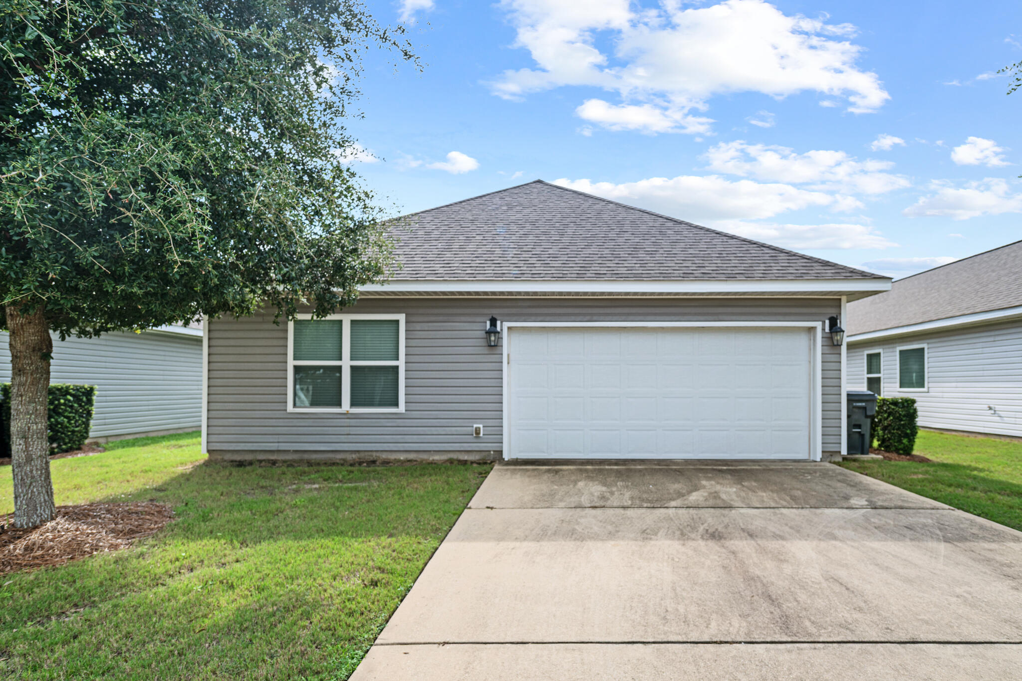 268 Cornelia Street Freeport, FL 32439 - Photo 31 of 41 a view of a house with a yard