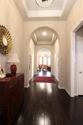 a view of livingroom with dining room and wooden floor