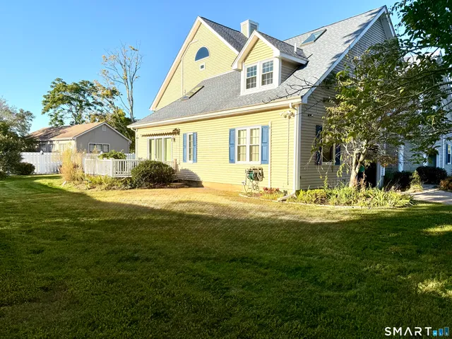 a view of a balcony with wooden floor