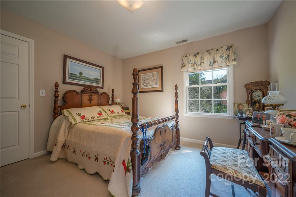 375 General Griffith Circle Rutherfordton, NC 28139 - Photo 12 of 36 a bedroom with a bed and a window