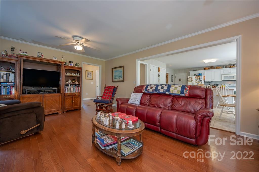 375 General Griffith Circle Rutherfordton, NC 28139 - Photo 16 of 36 a living room with furniture and a flat screen tv