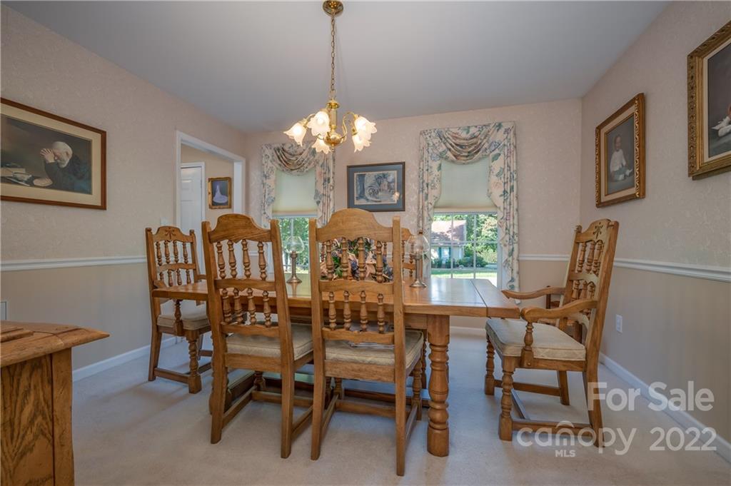 375 General Griffith Circle Rutherfordton, NC 28139 - Photo 17 of 36 a view of a dining room with furniture window and wooden floor