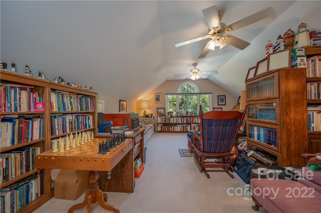 375 General Griffith Circle Rutherfordton, NC 28139 - Photo 26 of 36 a reading room with furniture book shelf and a rug