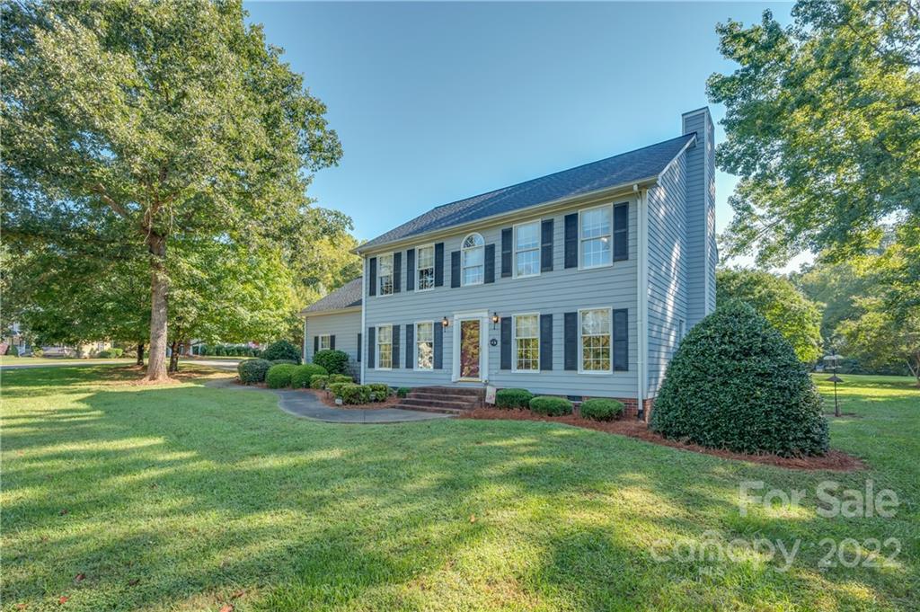 375 General Griffith Circle Rutherfordton, NC 28139 - Photo 31 of 36 a front view of a house with garden and trees
