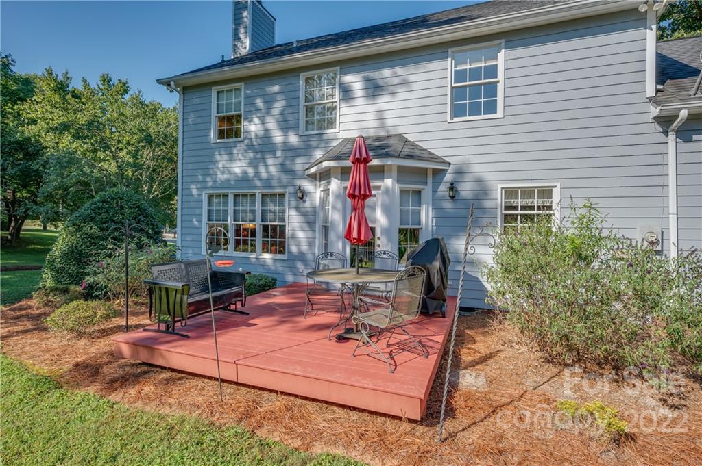 375 General Griffith Circle Rutherfordton, NC 28139 - Photo 32 of 36 a view of a house with backyard and sitting area