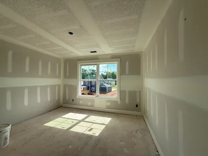 an empty room with windows
