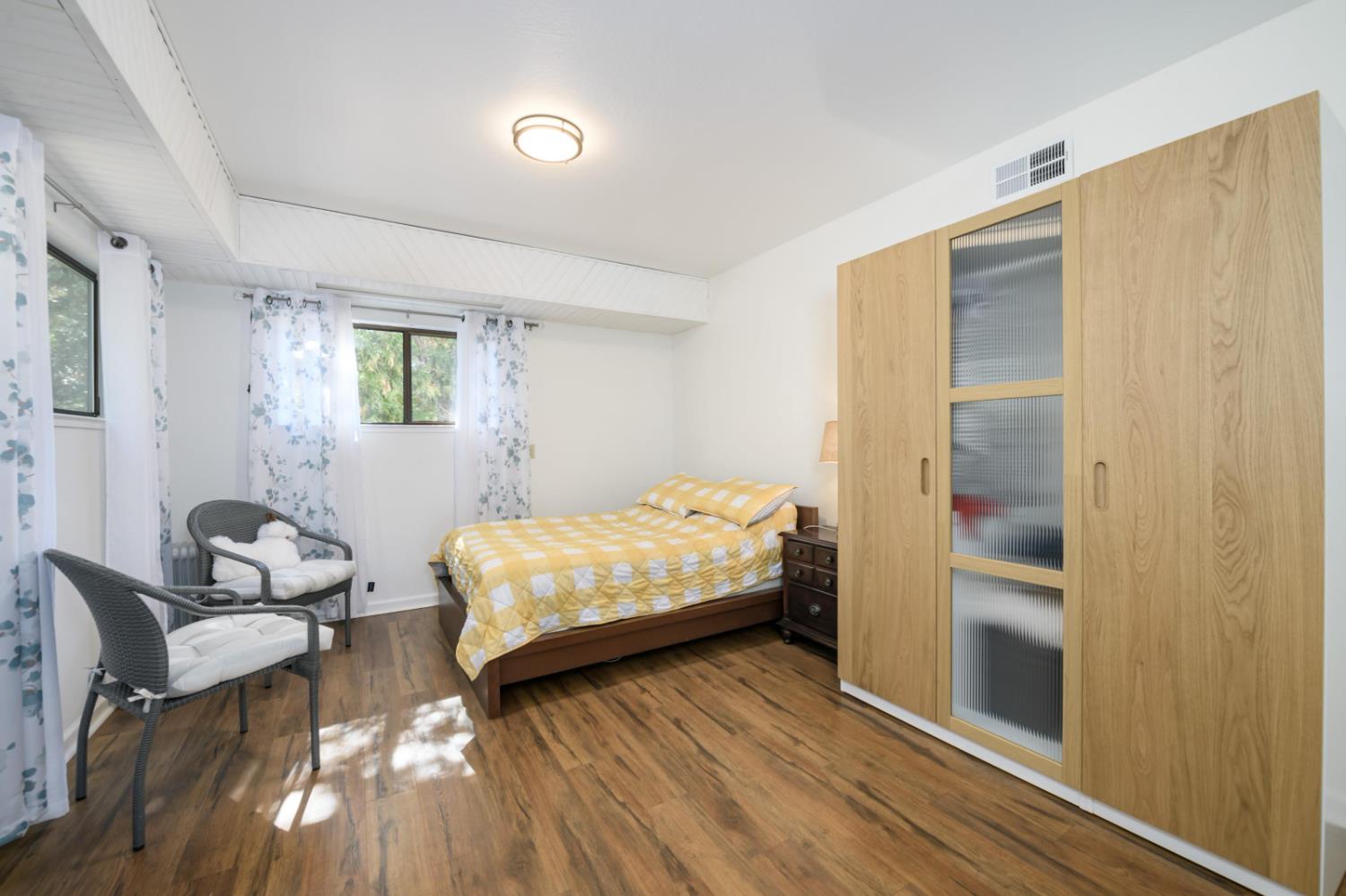 2921 Miller Way Placerville, CA 95667 - Photo 17 of 29 a bedroom with a bed and windows