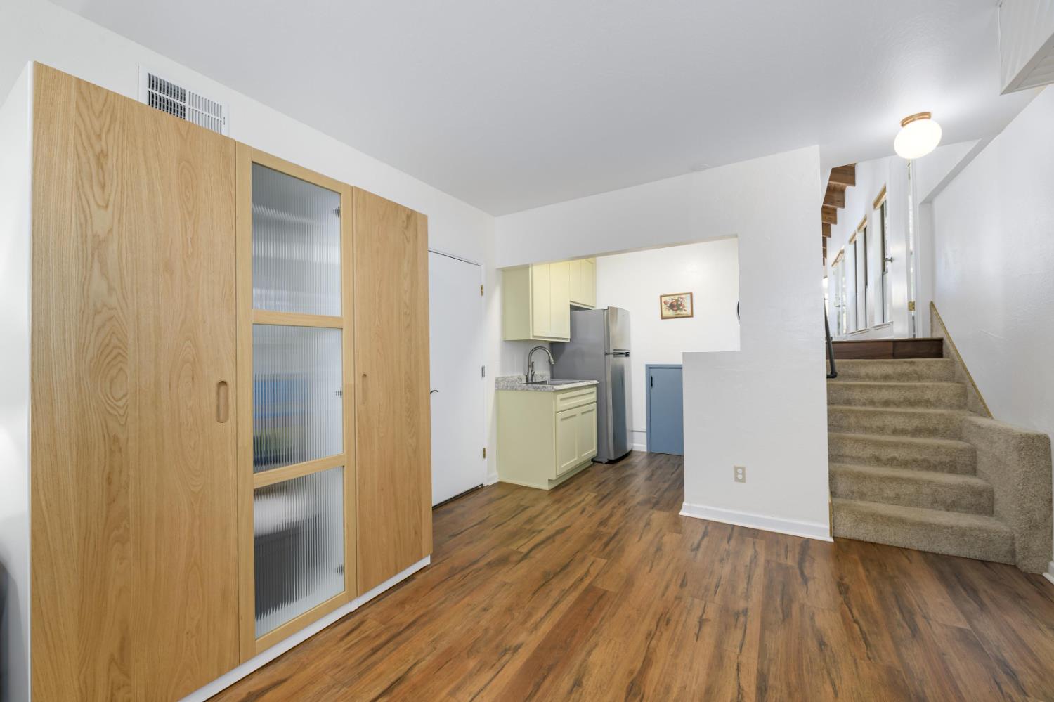 2921 Miller Way Placerville, CA 95667 - Photo 18 of 29 a view of a kitchen with wooden floor and a refrigerator