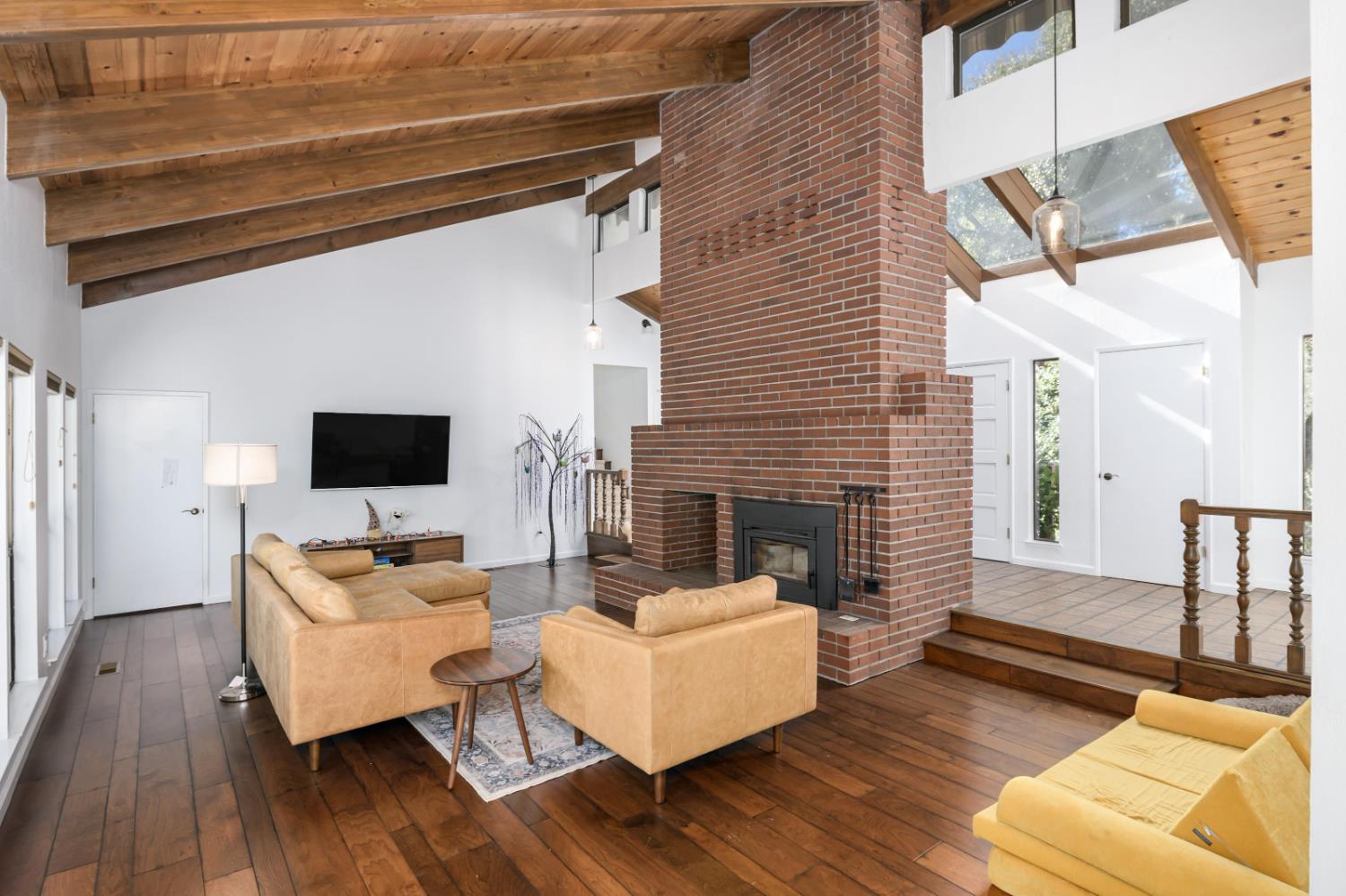 2921 Miller Way Placerville, CA 95667 - Photo 4 of 29 a living room with furniture wooden floor and a flat screen tv