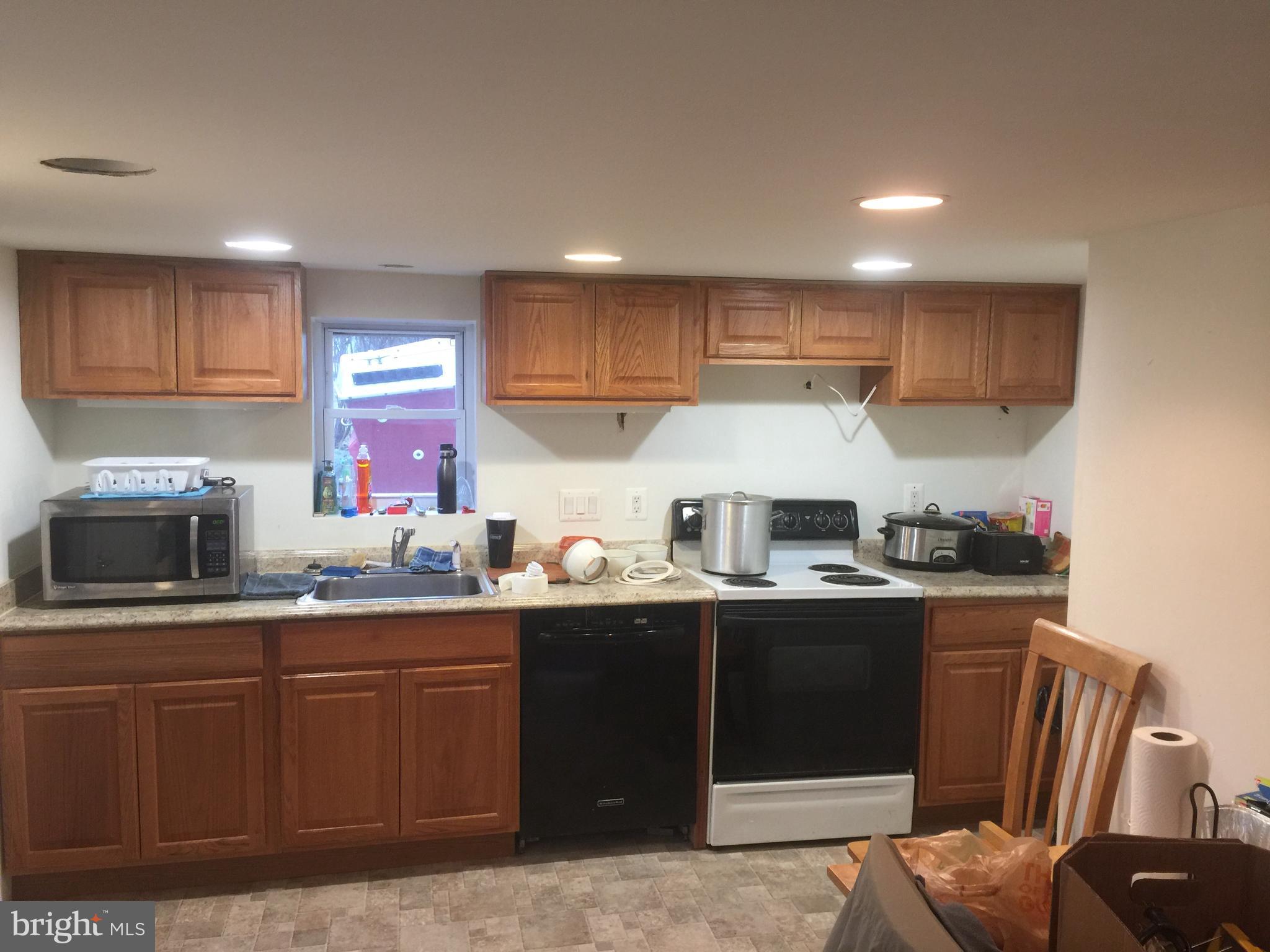 303 Adam Road Frederick, MD 21701 - Photo 2 of 11 Kitchen has new cabinets, counter tops, & flooring