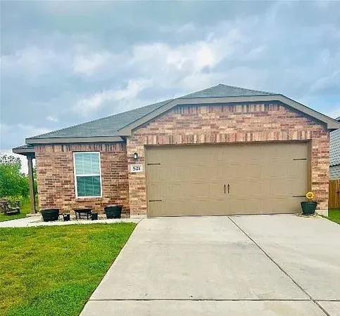 a front view of house with yard