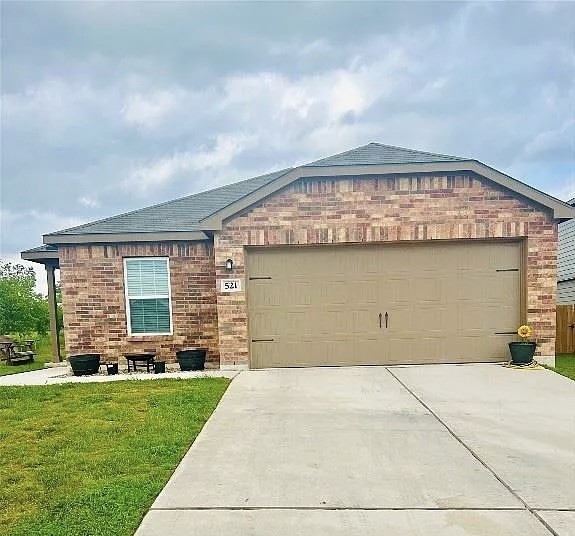 a front view of house with yard