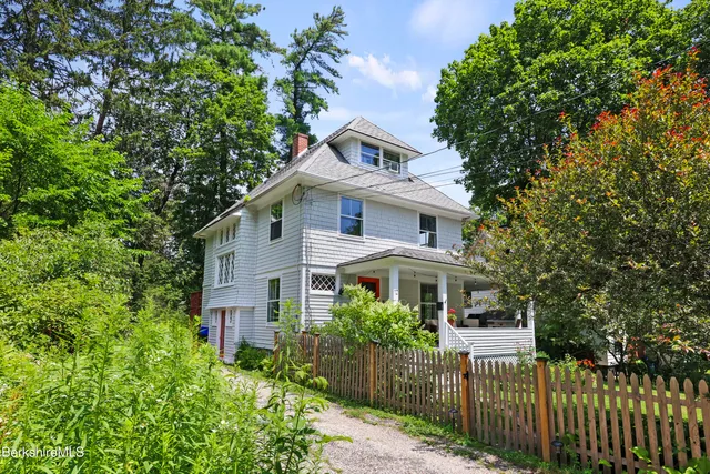 a house view with a garden space