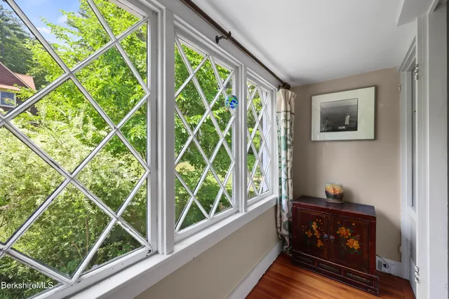 a room with a bed and a window