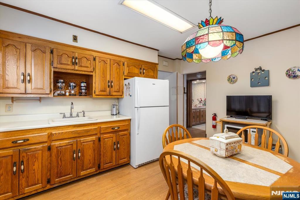 7 Delafield Avenue Rutherford, NJ 07070 - Photo 9 of 30 a kitchen with stainless steel appliances granite countertop a sink refrigerator and microwave