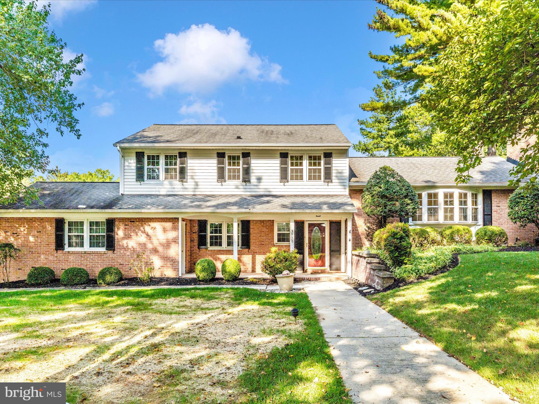 3930 Chatham Road Ellicott City, MD 21042 - Photo 1 of 51 a front view of a house with garden