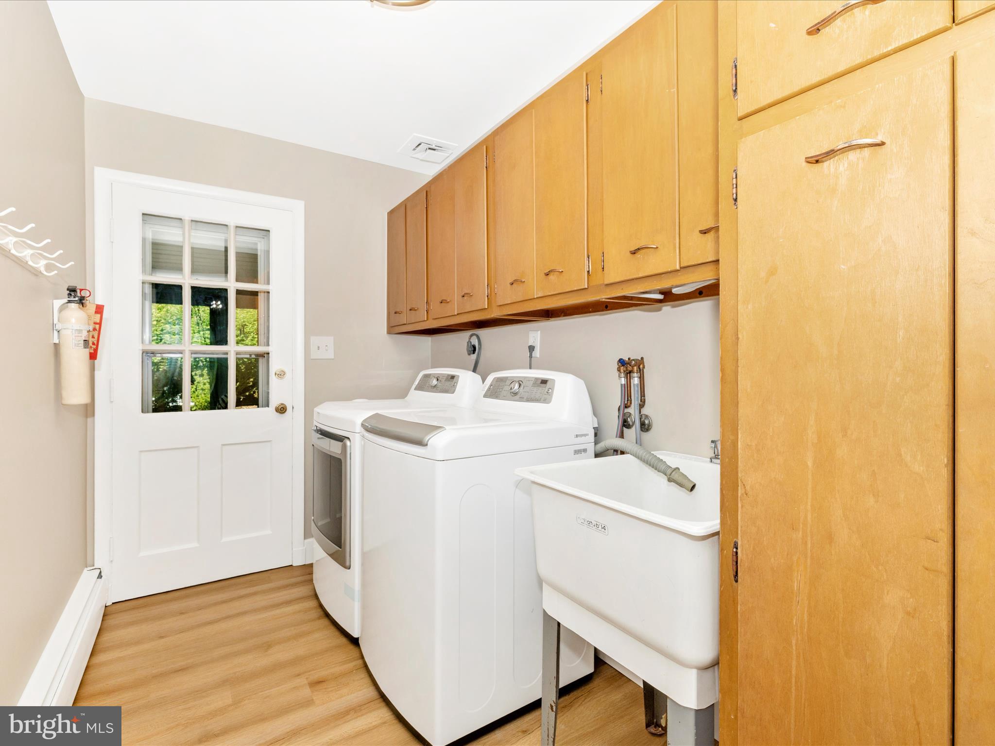 3930 Chatham Road Ellicott City, MD 21042 - Photo 12 of 51 a utility room with dryer and washer
