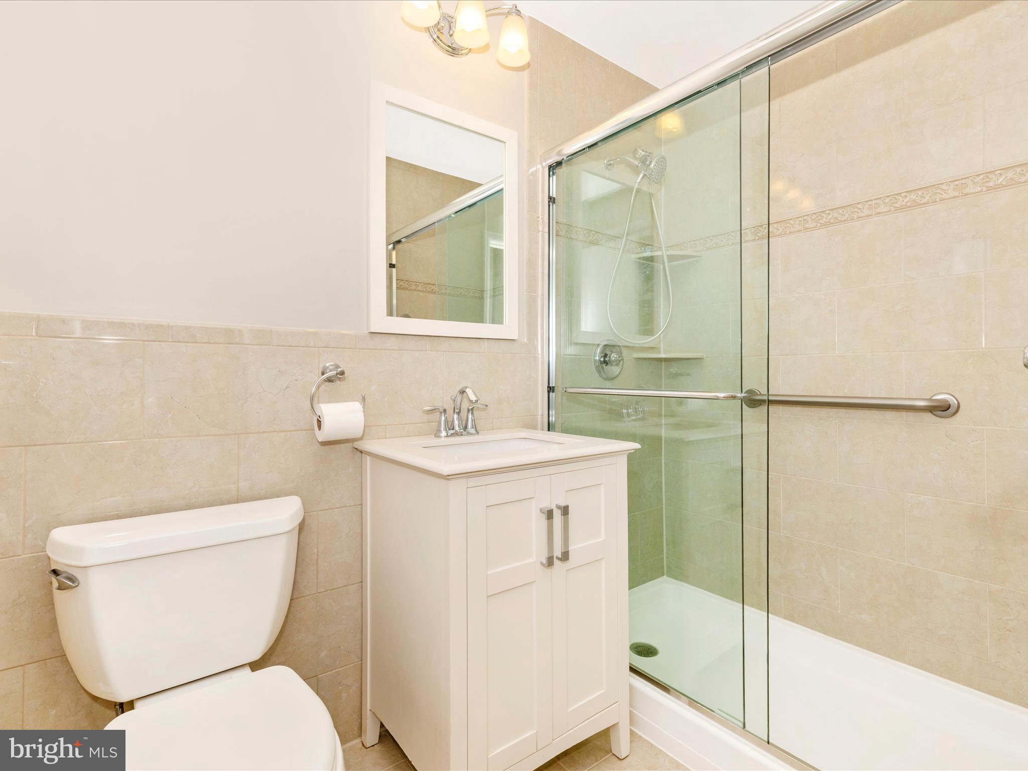 3930 Chatham Road Ellicott City, MD 21042 - Photo 25 of 51 a bathroom with a toilet sink and shower