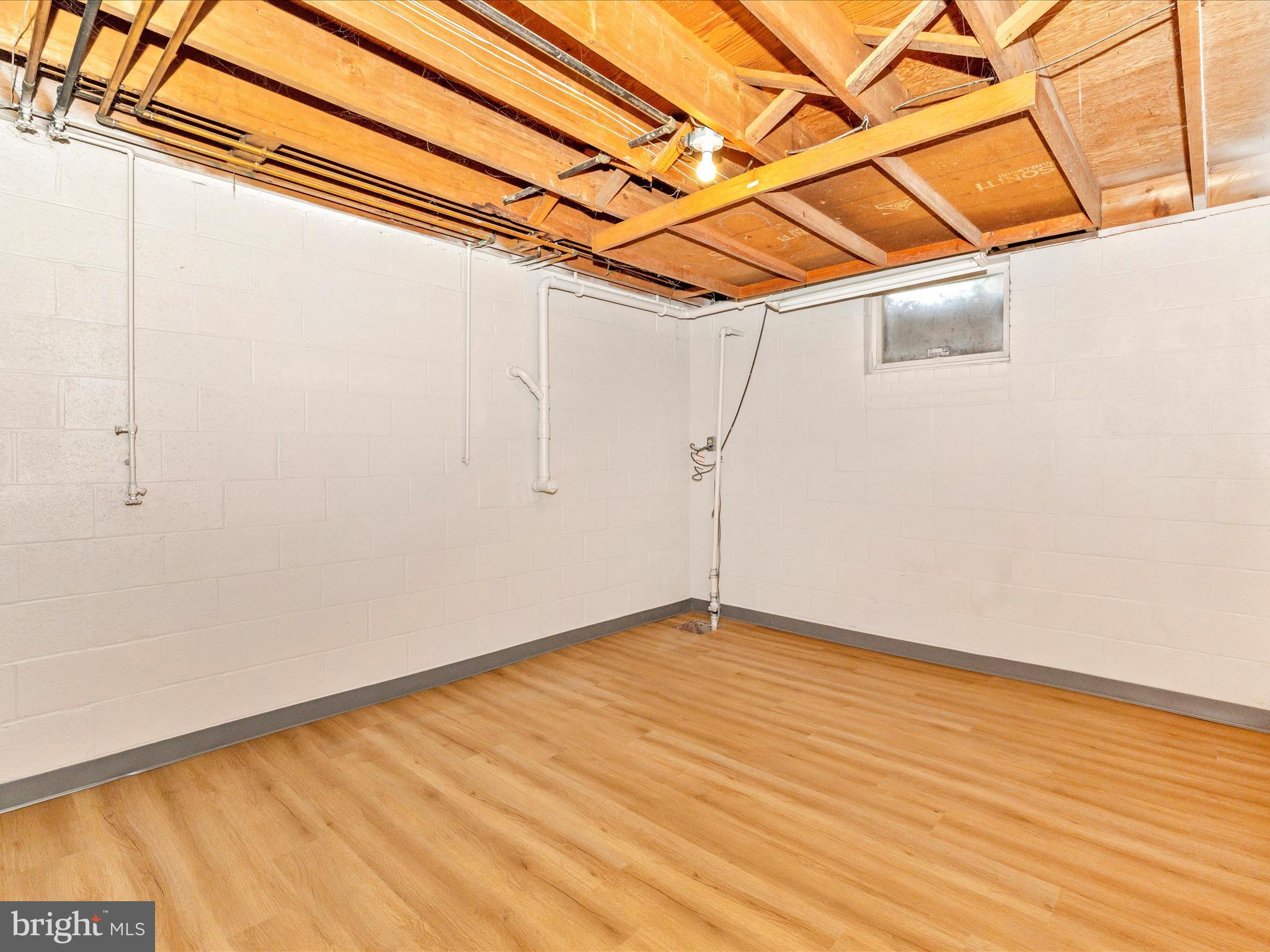 3930 Chatham Road Ellicott City, MD 21042 - Photo 36 of 51 a view of a room with wooden floor and a building